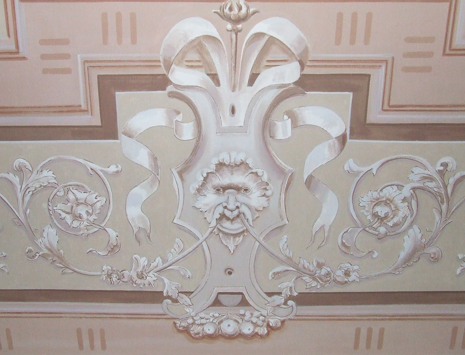 Particolare di soffitto con mascherone decorativo